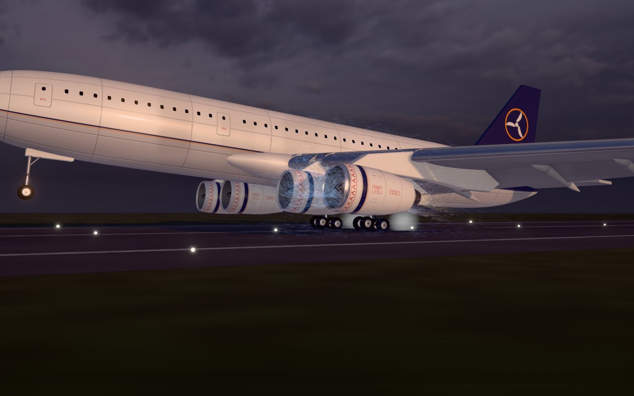 The aircraft a moment before touchdown on a lit runway